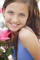 Image showing Pretty Young Girl Holding Flower Bouquet at the Market