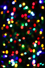 Image showing Holiday unfocused color lights