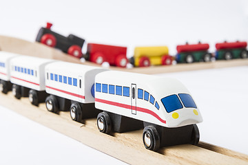 Image showing wooden toy trains on railway