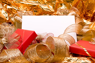 Image showing Christmas background. Shiny gifts.