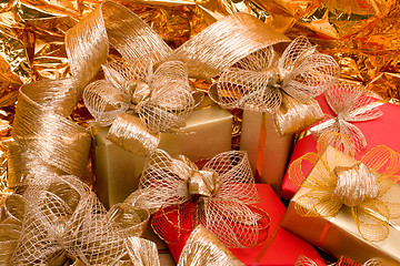 Image showing Christmas background. Shiny gifts.