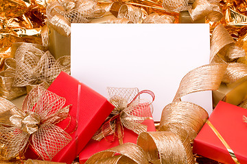 Image showing Christmas background. Shiny gifts.