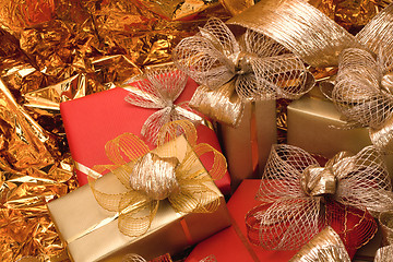 Image showing Christmas background. Shiny gifts.