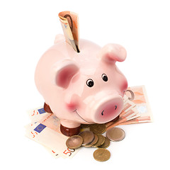 Image showing Business concept. Lucky piggy bank isolated on white background.