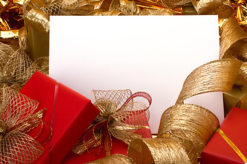 Image showing Christmas background. Shiny gifts.