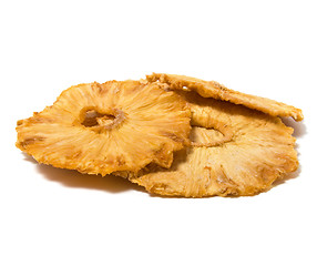 Image showing dried pineapples slices  isolated on white background
