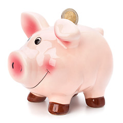 Image showing Business concept. Lucky piggy bank isolated on white background.