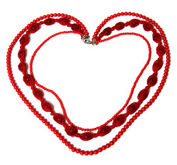 Image showing red necklace in heart shape isolated on white background