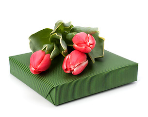 Image showing gift with pink tulips  isolated on white background