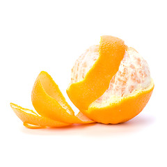 Image showing orange with peeled spiral skin isolated on white background