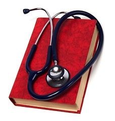 Image showing stethoscope on red book isolated on white background