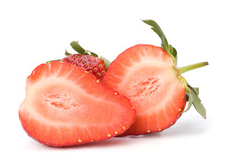 Image showing Halved strawberries isolated on white background