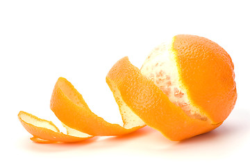 Image showing orange with peeled spiral skin isolated on white background