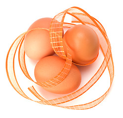 Image showing easter eggs with ribbon isolated on white