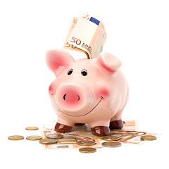 Image showing Business concept. Lucky piggy bank isolated on white background.