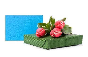 Image showing gift with pink tulips  isolated on white background