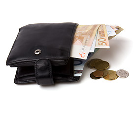 Image showing Money in leather  purse isolated on white  background 