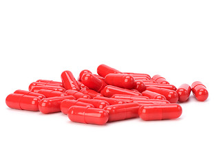 Image showing red capsules isolated on white background