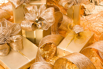 Image showing Christmas background. Shiny gifts.