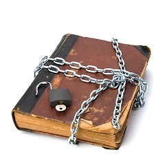 Image showing tattered book with chain and padlock isolated on white backgroun