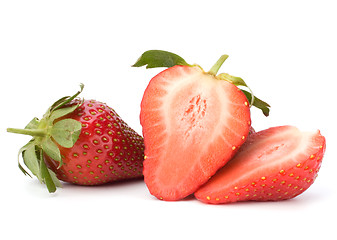 Image showing Halved strawberries isolated on white background
