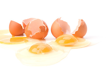 Image showing broken eggs isolated on white background