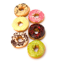 Image showing Delicious doughnuts isolated on white background 