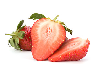 Image showing Halved strawberries isolated on white background