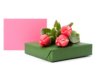 Image showing gift with pink tulips  isolated on white background