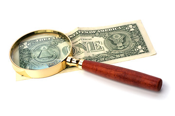 Image showing hand magnifier over banknote isolated on white background