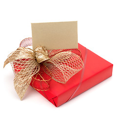 Image showing Luxurious gift with note isolated on white background 