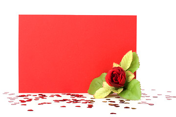 Image showing Card with floral decor. Flowers are artificial. 