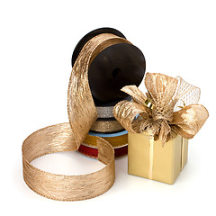 Image showing Festive gift box and wrapping ribbons isolated on white backgrou