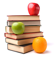 Image showing book stack with fruits isolated on white background 