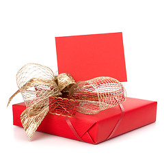 Image showing Luxurious gift with note isolated on white background 