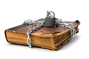 Image showing tattered book with chain and padlock isolated on white backgroun