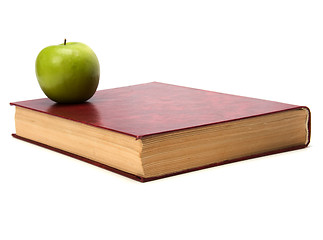 Image showing book with apple isolated on white background 