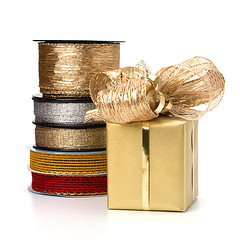 Image showing Festive gift box and wrapping ribbons isolated on white backgrou