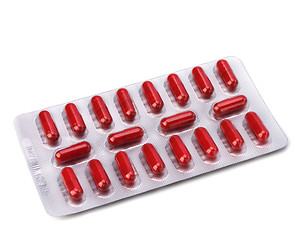 Image showing medical capsules isolated on white