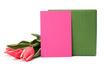 Image showing gift with pink tulips  isolated on white background