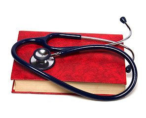 Image showing stethoscope on red book isolated on white background