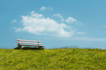 Image showing Bench on sky background. Tranquil scene.