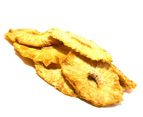 Image showing dried pineapples slices  isolated on white background
