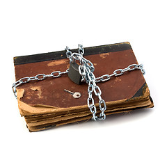 Image showing tattered book with chain and padlock isolated on white backgroun