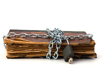 Image showing tattered book with chain and padlock isolated on white backgroun