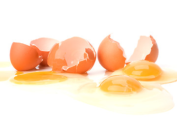 Image showing broken eggs isolated on white background