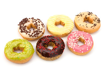 Image showing Delicious doughnuts isolated on white background 