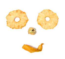 Image showing human face imitation with dried fruits isolated on white backgro