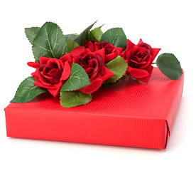 Image showing Gift with floral decor. Flowers are artificial. 
