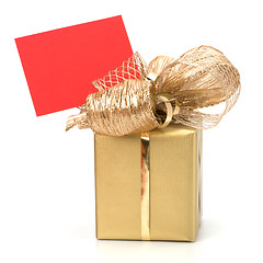 Image showing Luxurious gift with note isolated on white background 